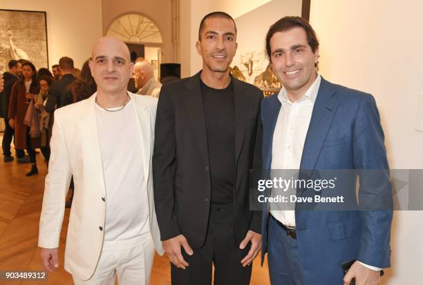 Steve Lazarides, Wissam Al Mana and Pierre Lussato attend the private view of "JR: Giants - Body of Work" at Lazinc on January 10, 2018 in London,...