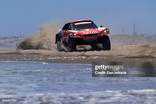 Cyril Despres of France and Peugeot Total drives with co-driver David Castera of France in the 3008 DKR Peugeot car in the Classe : T1.4 2 Roues...