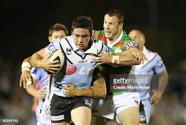 Grant Millington of the Sharks in action during the round 26 NRL match between the Cronulla Sharks and the South Sydney Rabbitohs at Toyota Stadium...