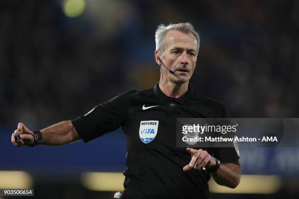 Referee Martin Atkinson looks on during the Carabao Cup Semi-Final first leg match between Chelsea and Arsenal at Stamford Bridge on January 10, 2018...