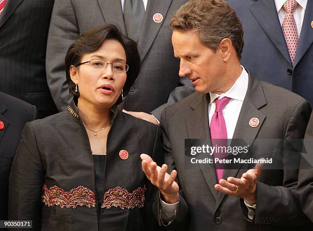 Treasury Secretary Timothy Geithner talks with Indonesian Finance Minister Sri Mulyani Indrawati during the G20 meeting at the Treasury on September...