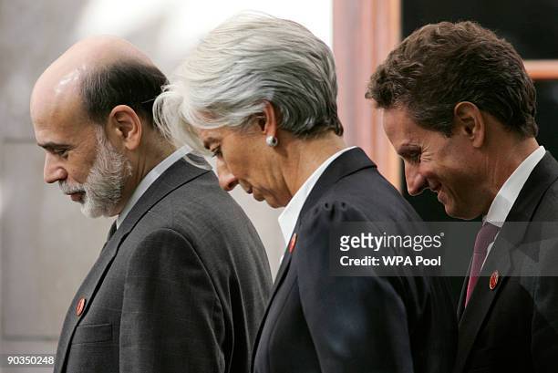 Federal Reserve Bank Chairman Ben Bernanke, French finance minister Christine Lagarde, and US Treasury Secretary Tim Geithner walk following a group...