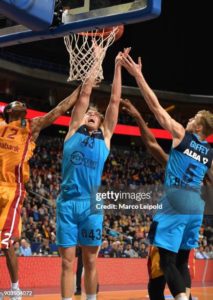 Alex Renfroe of Galatasay Istanbul, Luke Sikma and Niels Giffey of Alba Berlin during the game between Alba Berlin and Galatasaray Istanbul on...