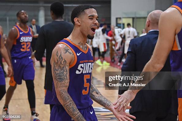 Isjsm Josh Gray of the Northern Arizona Suns celebrates and shakes hands ...