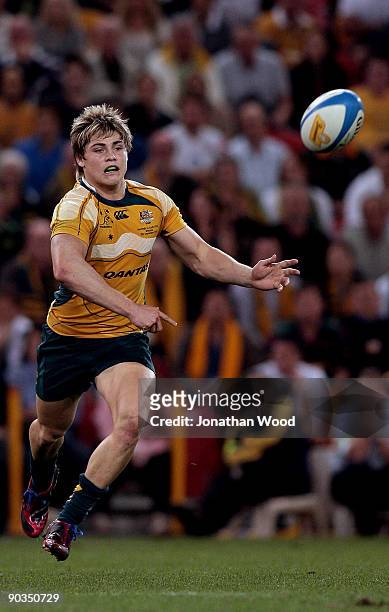 JAmes O'Connor of the Wallabies gets a pass away during the 2009 Tri Nations series match between the Australian Wallabies and the South African...