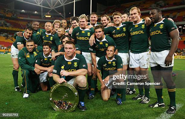 Springbok players pose with the Nelson Mandella Challenge Plate following the 2009 Tri Nations series match between the Australian Wallabies and the...