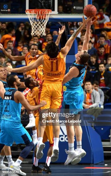 Akeem Vargas of Alba Berlin, Ege Arar of Galatasay Istanbul and Dennis Clifford of Alba Berlin during the game between Alba Berlin and Galatasaray...
