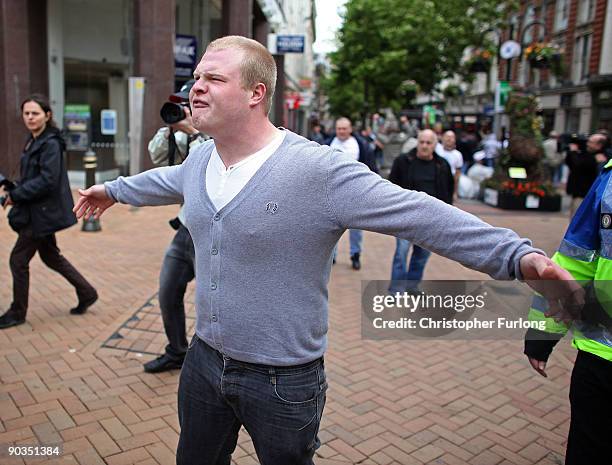 Members of the English Defence League shout towards Police and anti-right wing protesters during a rally on September 5, 2009 in Birmingham, England....