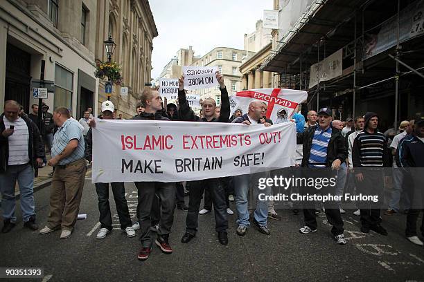 Members of the English Defence League shout towards Police and anti-right wing protesters during a rally on September 5, 2009 in Birmingham, England....