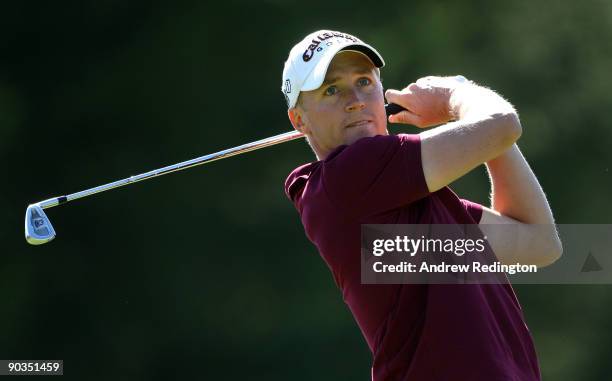 Alexander Noren of Sweden watches his tee-shot on the 16th hole during the third round of The Omega European Masters at Crans-Sur-Sierre Golf Club on...