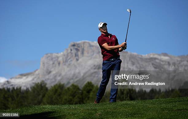 Alexander Noren of Sweden plays his second shot on the 12th hole during the third round of The Omega European Masters at Crans-Sur-Sierre Golf Club...