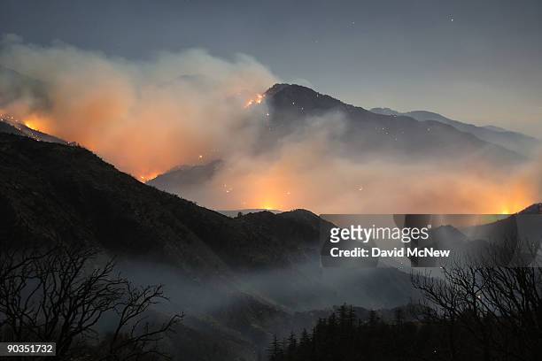 The 241-square-mile Station Fire continues to blacken forests and race up rugged canyons along its eastern front deep in the Angeles National Forest...