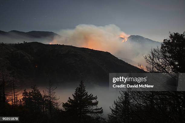 The 241-square-mile Station Fire continues to blacken forests and race up rugged canyons along its eastern front deep in the Angeles National Forest...