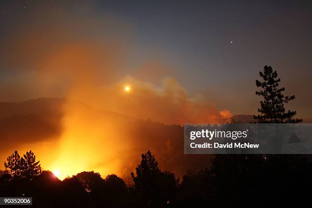 The 241-square-mile Station Fire continues to blacken forests and race up rugged canyons along its eastern front deep in the Angeles National Forest...