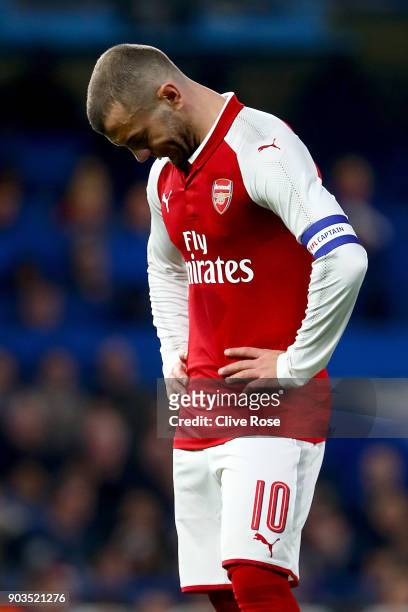 Jack Wilshere of Arsenal looks on dejected during the Carabao Cup Semi-Final First Leg match between Chelsea and Arsenal at Stamford Bridge on...