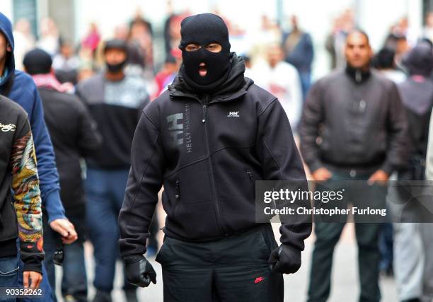 Anti-right wing youths taunt members of the English Defence League during a rally on September 5, 2009 in Birmingham, England. The English Defence...