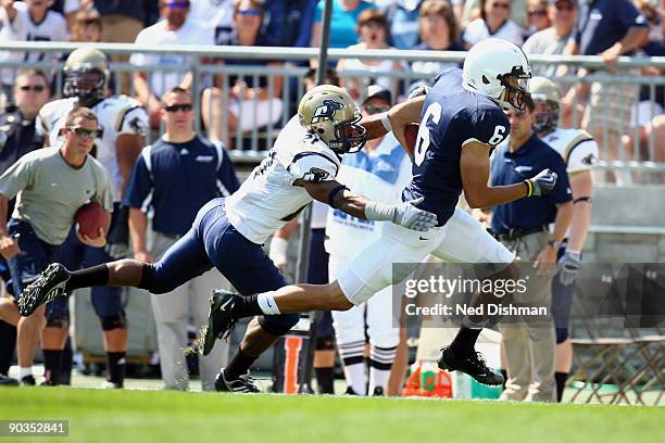 Wide receiver Derek Moye of the Penn State Nittany Lions runs after a catch against Wayne Cobham of the University of Akron Zips at Beaver Stadium on...