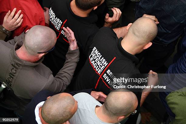 Members of the English Defence League are corralled by police in a subway during a rally on September 5, 2009 in Birmingham, England. The English...