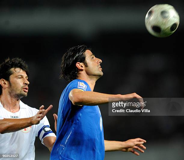 Vincenzo Iaquinta of Italy and Kakha Kaladze during the FIFA 2010 World Cup Qualifier match between Georgia and Italy at Boris Paichadze National...