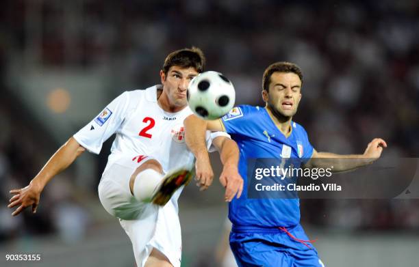 Giuseppe Rossi of Italy and Ucha Lobbjanidze during the FIFA 2010 World Cup Qualifier match between Georgia and Italy at Boris Paichadze National...