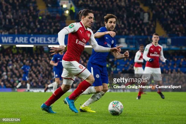 Arsenal's Hector Bellerin takes on Chelsea's Cesc Fabregas during the Carabao Cup Semi-Final First Leg match between Chelsea and Arsenal at Stamford...