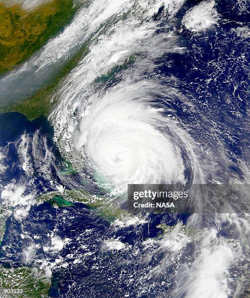 The southeastern portion of the eyewall in Hurricane Floyd passes over Abaco Island in the Bahamas, September 14, 1999. Hurricane Floyd has taken a...