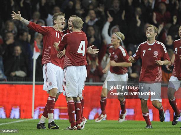 Denmark's Nicklas Bendtner celebrates after scoring during the FIFA World Cup 2010 qualifying match Denmark vs Portugal on September 5, 2009 at the...