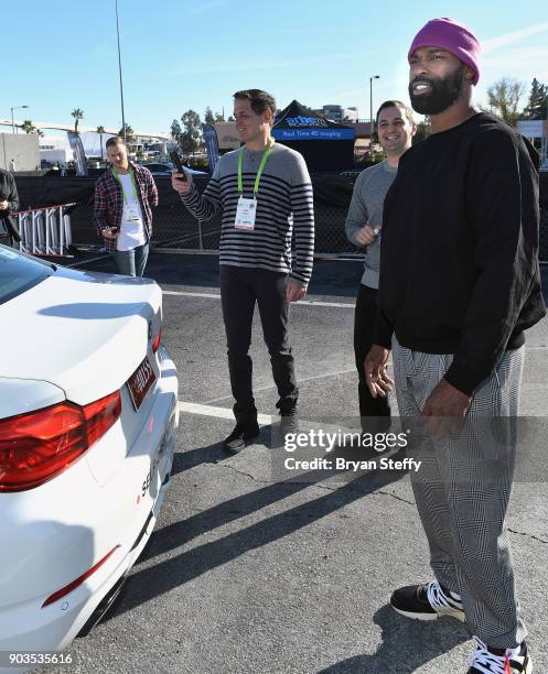 Businessman Mark Cuban, Lyft Co-founder and President John Zimmer and former NBA player Baron Davis attend the Lyft and Aptiv self-driving car...