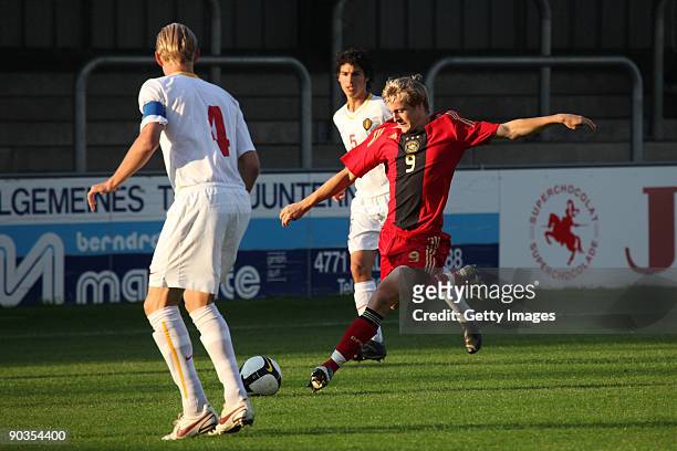 Birger Longueville of Belgium challenges Felix Kroos of Germany during the U19 international friendly match between Belgium and Germany at the...
