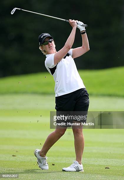 Karrie Webb of Australia hits her second shot on the seventh hole during the third round of the Canadian Women's Open at Priddis Greens Golf &...