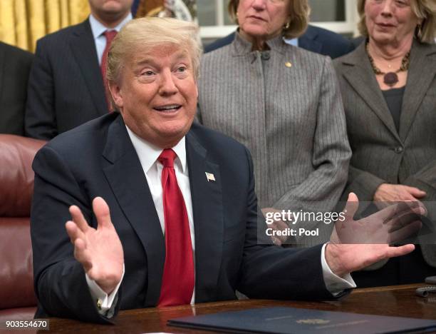 President Donald Trump makes remarks in the Oval Office prior to signing the bipartisan Interdict Act, a bill to stop the flow of opioids into the...