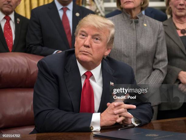 President Donald Trump makes remarks in the Oval Office prior to signing the bipartisan Interdict Act, a bill to stop the flow of opioids into the...