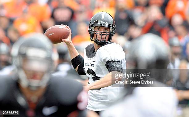 Drew Hubel of the Portland State Vikings sets to throw a pass in the fourth quarter of the game against the Oregon State Beavers at Reser Stadium on...