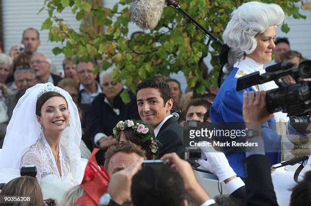Newlyweds Isabella Orsini and Prince Edouard de Ligne de la Tremoille leave the Antoing church after their wedding on September 5, 2009 in Antoing,...