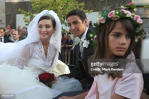 Newlyweds Isabella Orsini and Prince Edouard de Ligne de la Tremoille leave the Antoing church after their wedding on September 5, 2009 in Antoing,...