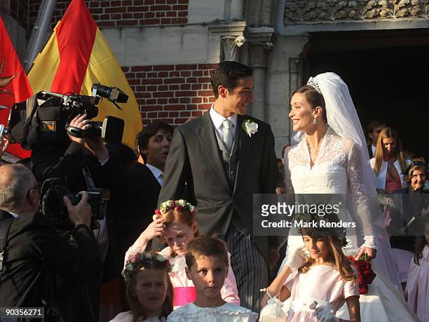 Newlyweds Prince Edouard de Ligne de la Tremoille and Isabella Orsini leave the Antoing church after their wedding on September 5, 2009 in Antoing,...