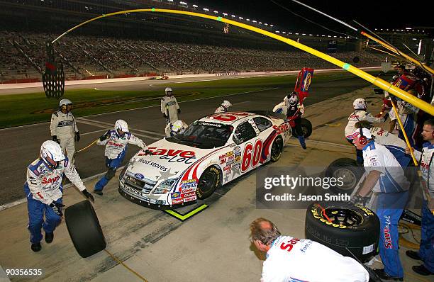 Carl Edwards, driver of the Save-A-Lot Ford pits during the NASCAR Nationwide Series Degree V12 300 at Atlanta Motor Speedway on September 5, 2009 in...