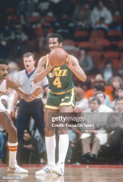 Adrian Dantley of the Utah Jazz looks to pass the ball against the Philadelphia 76ers during an NBA basketball game circa 1981 at The Spectrum in...