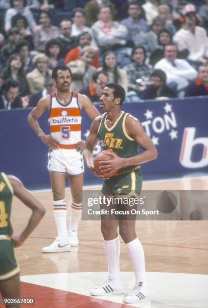 Adrian Dantley of the Utah Jazz shots a free throw against the Washington Bullets during an NBA basketball game circa 1982 at the Capital Centre in...