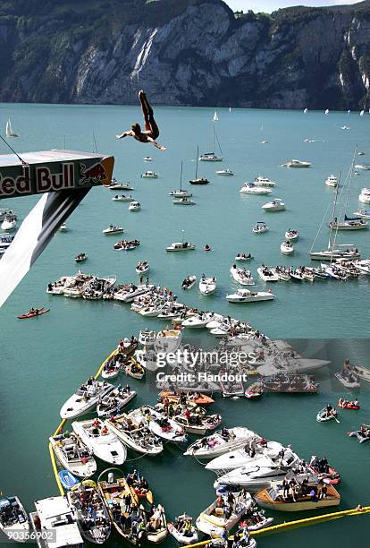 In this handout image provided by Dean Treml/Red Bull Photofiles, Artem Silchenko of Russia dives from the 26 metre platform during round seven of...