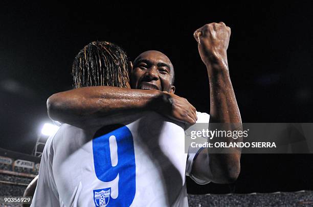 Honduran Carlos Pavon celebrates with Jerry Palacios after scoring against Trinidad and Tobago, during their FIFA World Cup South Africa-2010...
