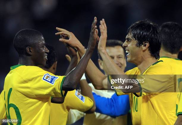 Brazil's footballers Dunga and Ramires celebrate after winning their FIFA World Cup South Africa-2010 qualifier football match against Argentina at...