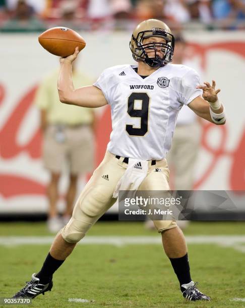 Quarterback Mitch Allen of the Wofford Terriers throws a pass against the South Florida Bulls during the game at Raymond James Stadium on September...