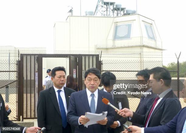 Japanese Defense Minister Itsunori Onodera speaks to reporters on the Hawaiian island of Kauai on Jan. 10 after visiting a test complex of the...