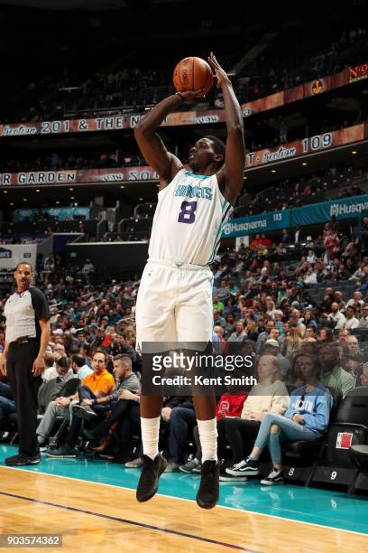 Johnny O'Bryant III of the Charlotte Hornets shoots the ball against the Dallas Mavericks on January 10, 2018 at Spectrum Center in Charlotte, North...
