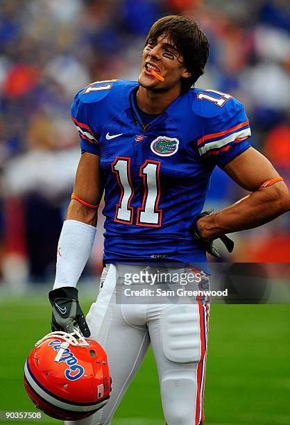 Riley Cooper of the Florida Gators watches the action during the game against the Charleston Southern Buccaneers at Ben Hill Griffin Stadium on...