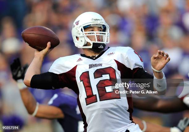 Quarterback Kyle Havens of the Massachusetts Minutemen gets ready to through a pass down field during the second quarter against the Kansas State...