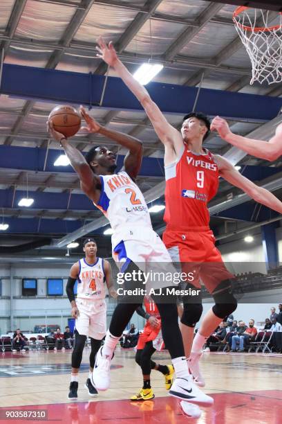 Damyean Dotson of the Westchester Knicks shoots the ball against Zhou Qi of the Rio Grande Valley Vipers at NBA G League Showcase Game 6 between the...