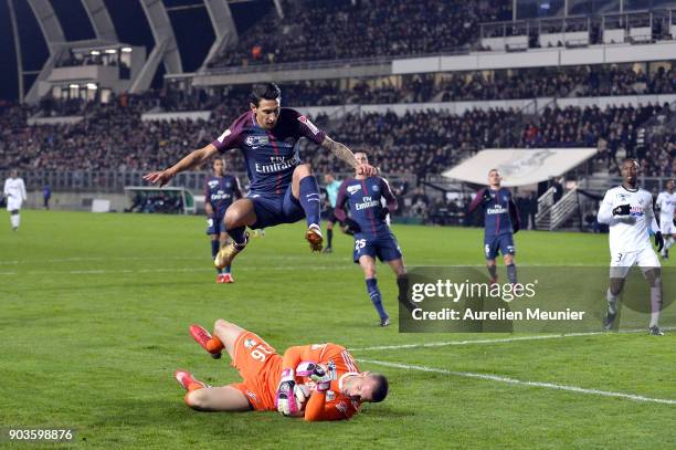 Amien goalkeeper Jean-Christophe Bouet catches the ball in front of Angel Di Maria of Paris Saint-Germainduring the League cup match between Amiens...