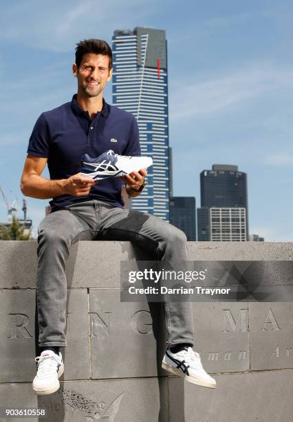 Novak Djokovic poses ahead of an ASICS Brand Ambassador Announcement on Batman Avenue Bridge on January 11, 2018 in Melbourne, Australia.